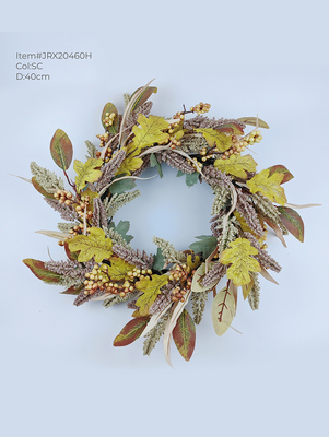Decorative artificial autumn leaves wreath with assort-colored berries